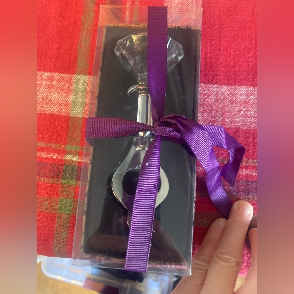 Faux diamond bottle opener. New in box. Super cute & Would make a great gift
